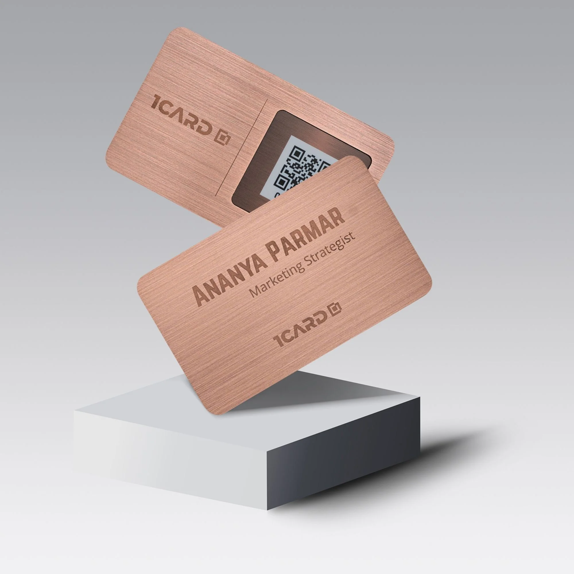 Copper-colored VIP card with "Ananya Parmar, Marketing Strategist" text and QR code, displayed on a white platform.